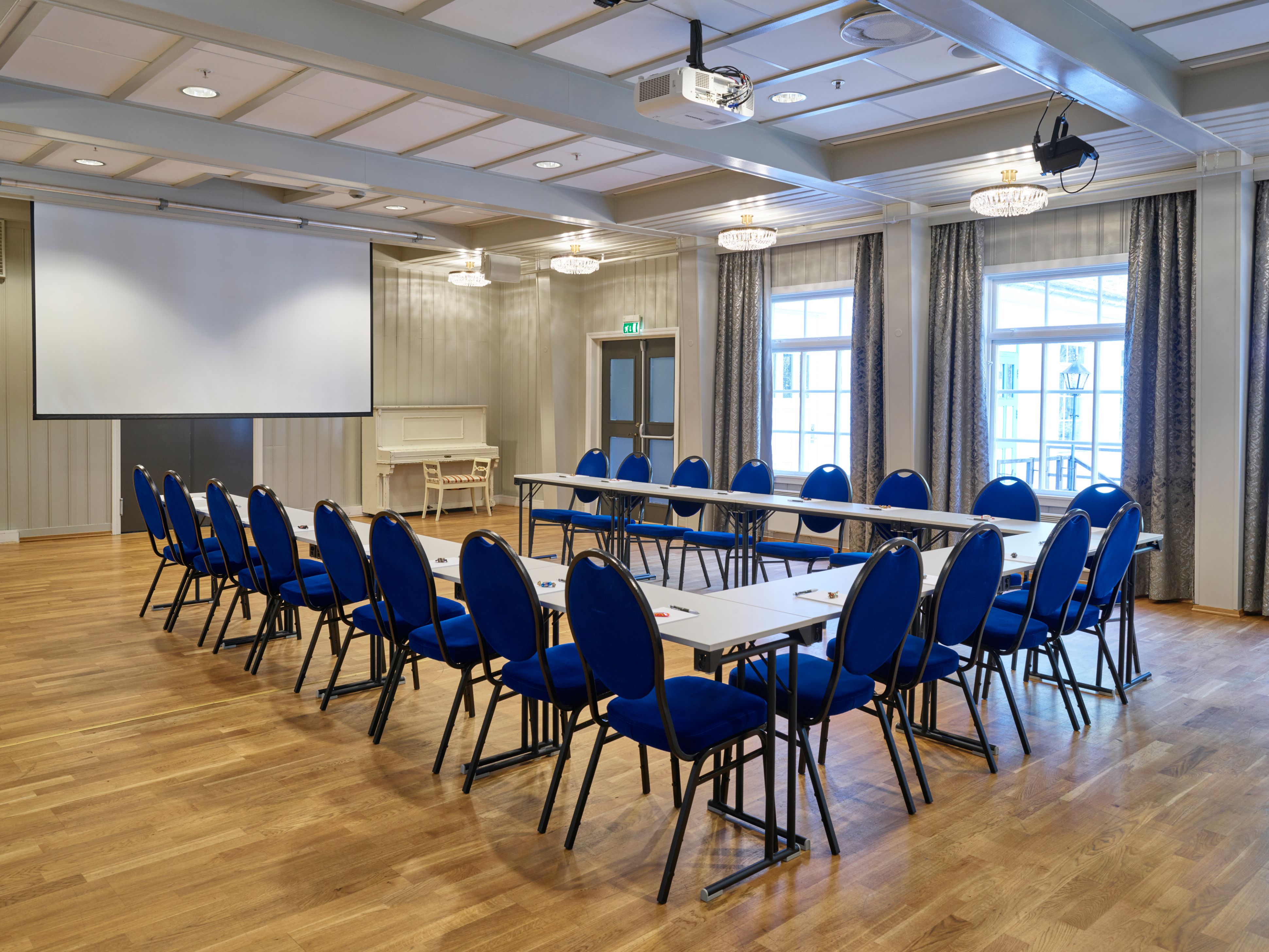 a room with tables and chairs