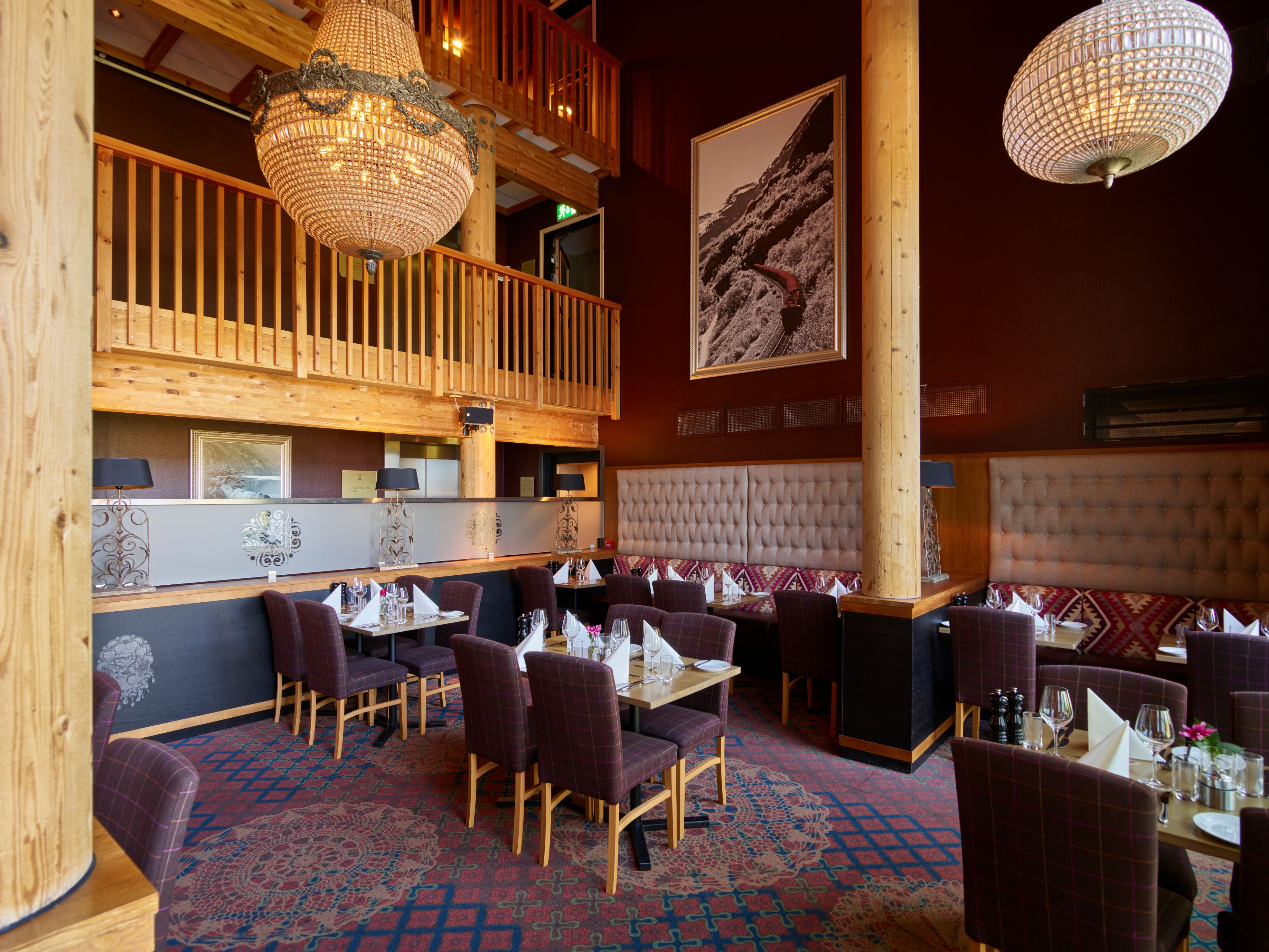 a restaurant with tables and chairs