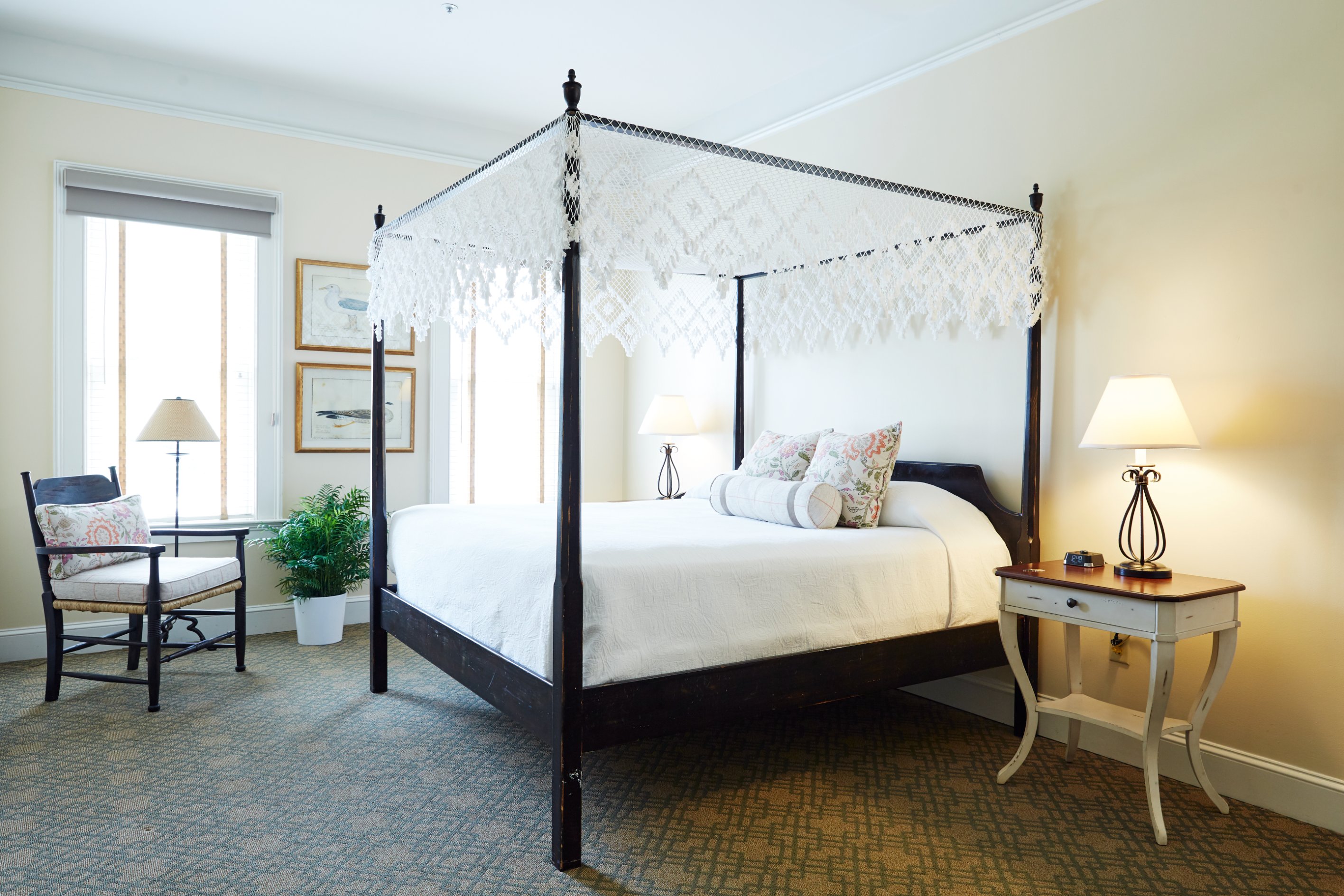 a bed with a canopy in a room