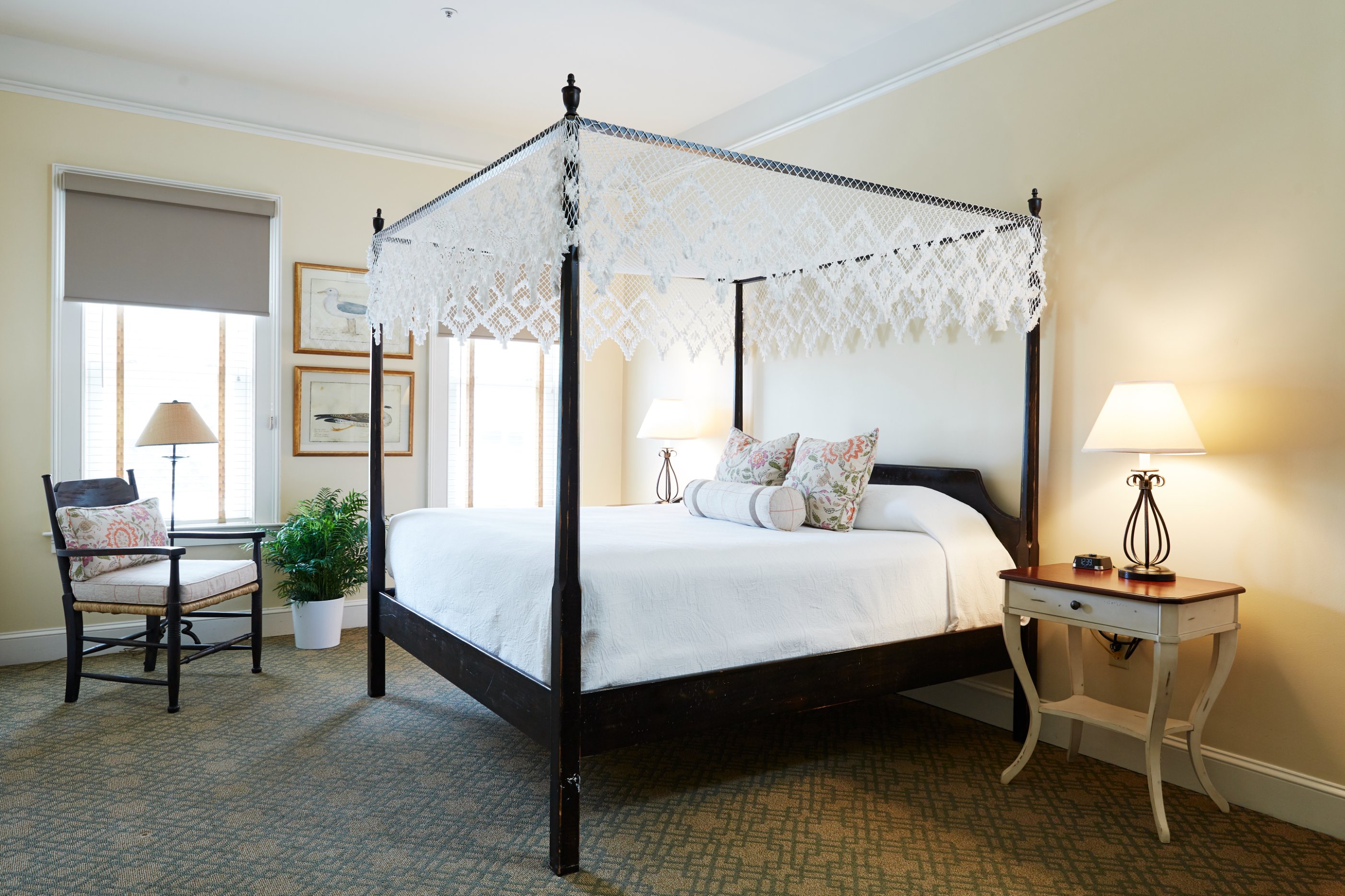 a bed with a canopy in a room