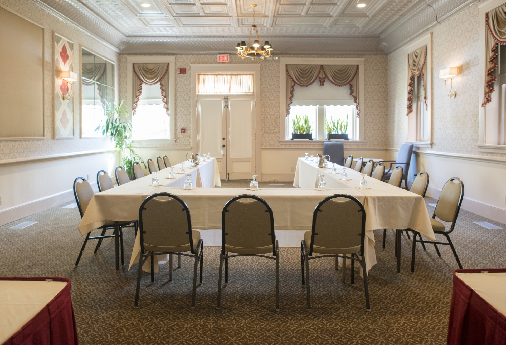 a room with a table and chairs