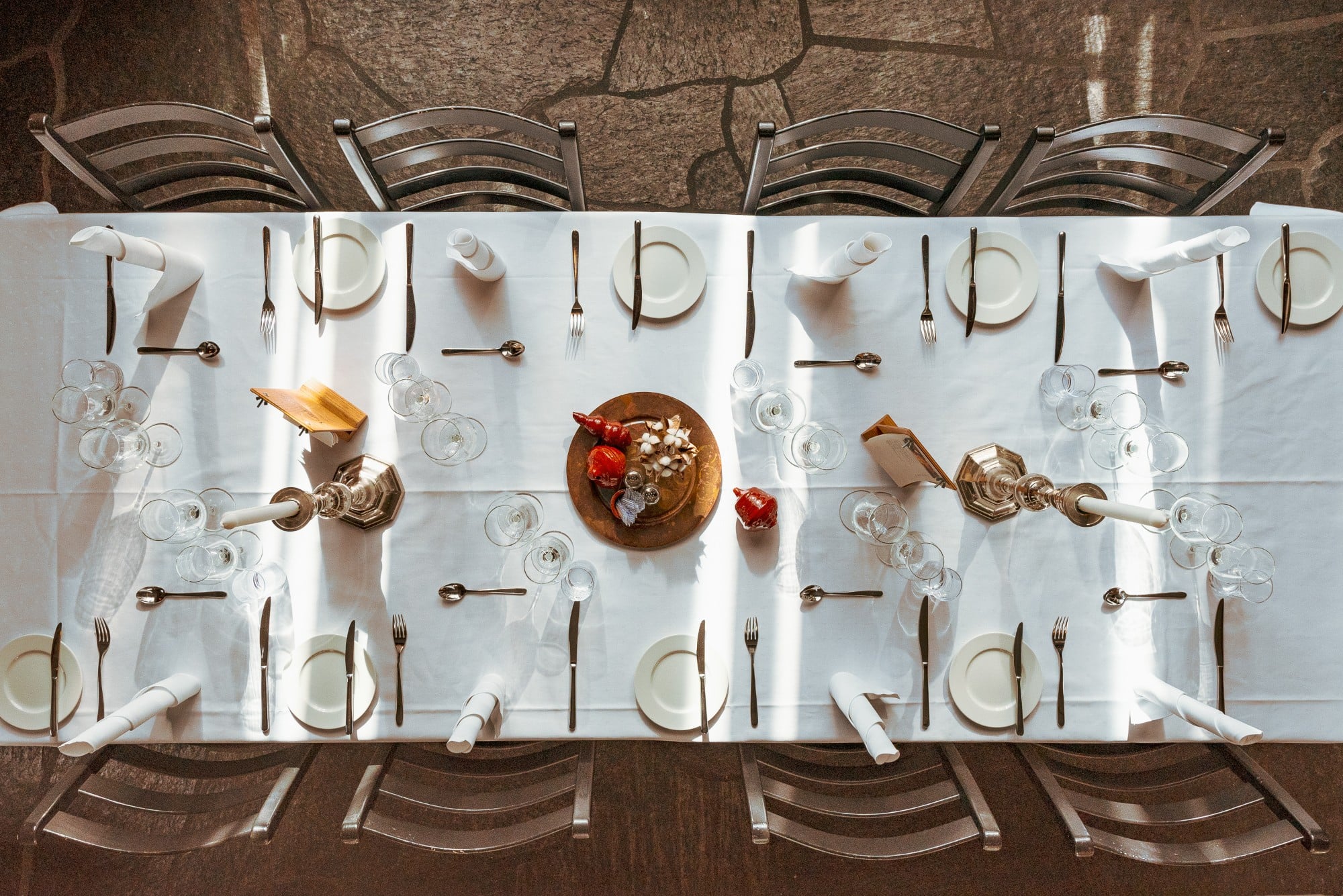 a table with plates and silverware