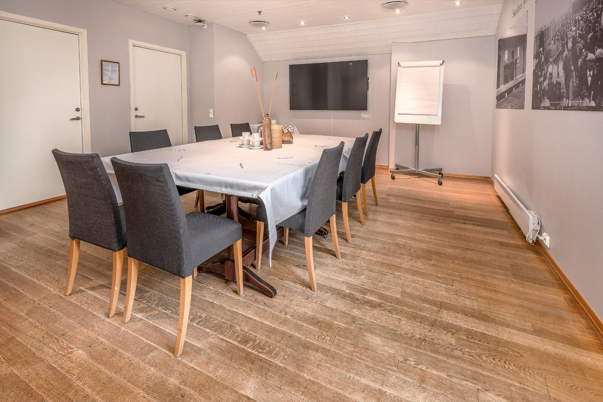 a room with a table and chairs