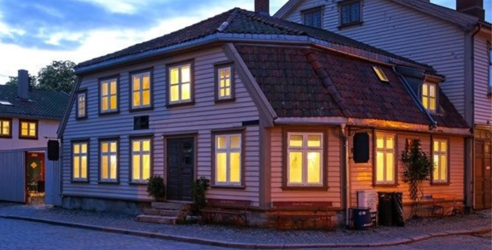 a house with lights on the windows