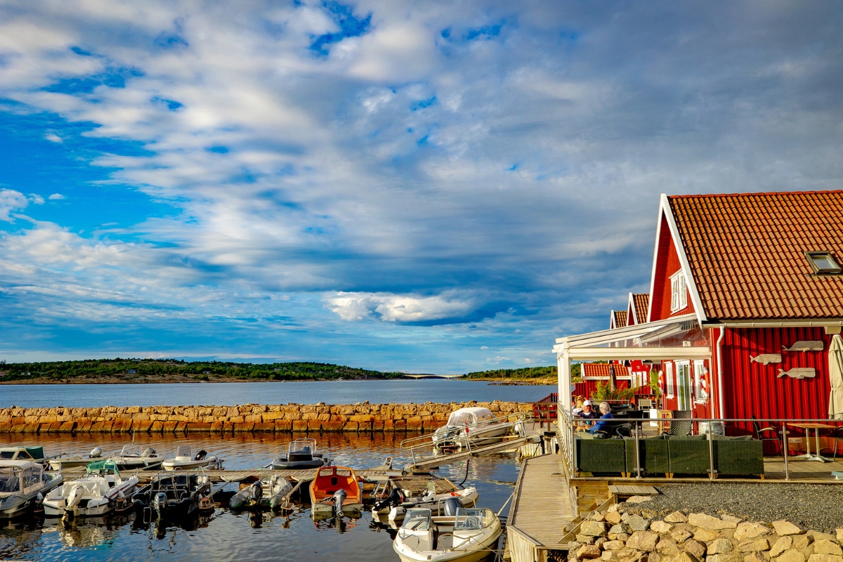 a house with boats on the water