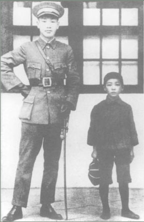 a man in a uniform with a boy