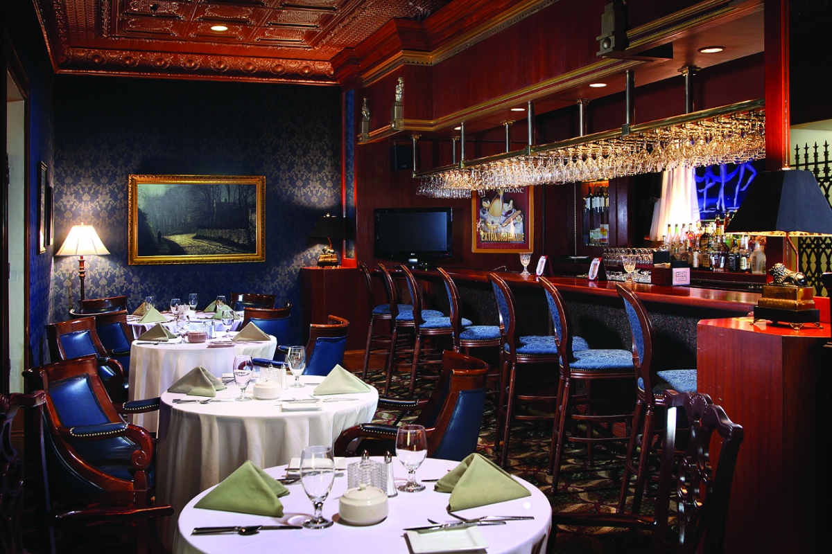 a restaurant with tables and chairs