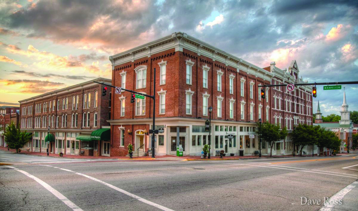 a building with a corner light on the corner