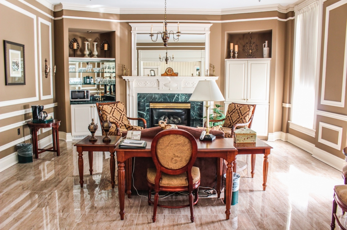 a dining room with a table and chairs
