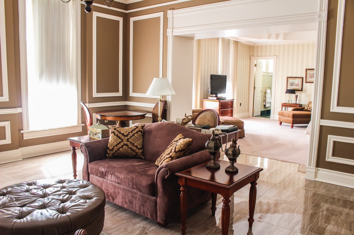 a living room with a couch and a table