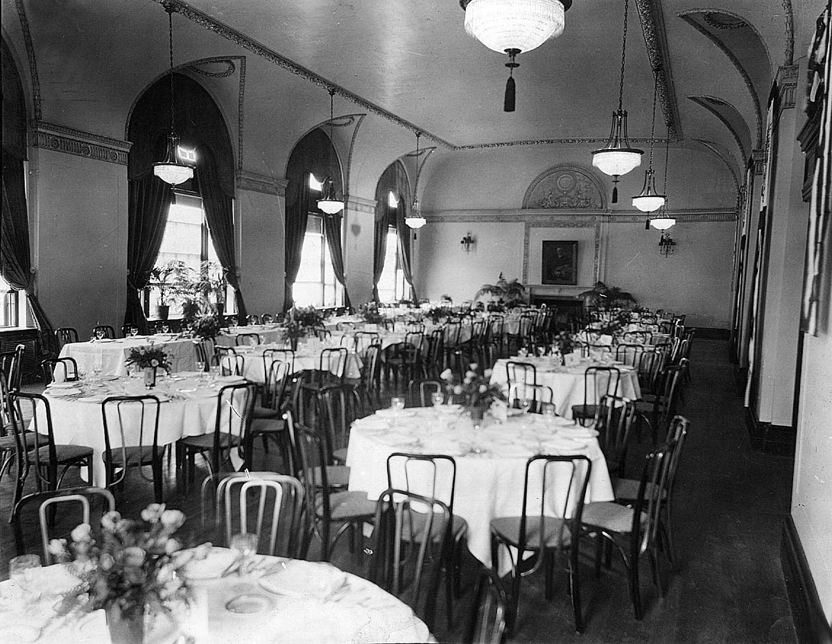 a room with tables and chairs