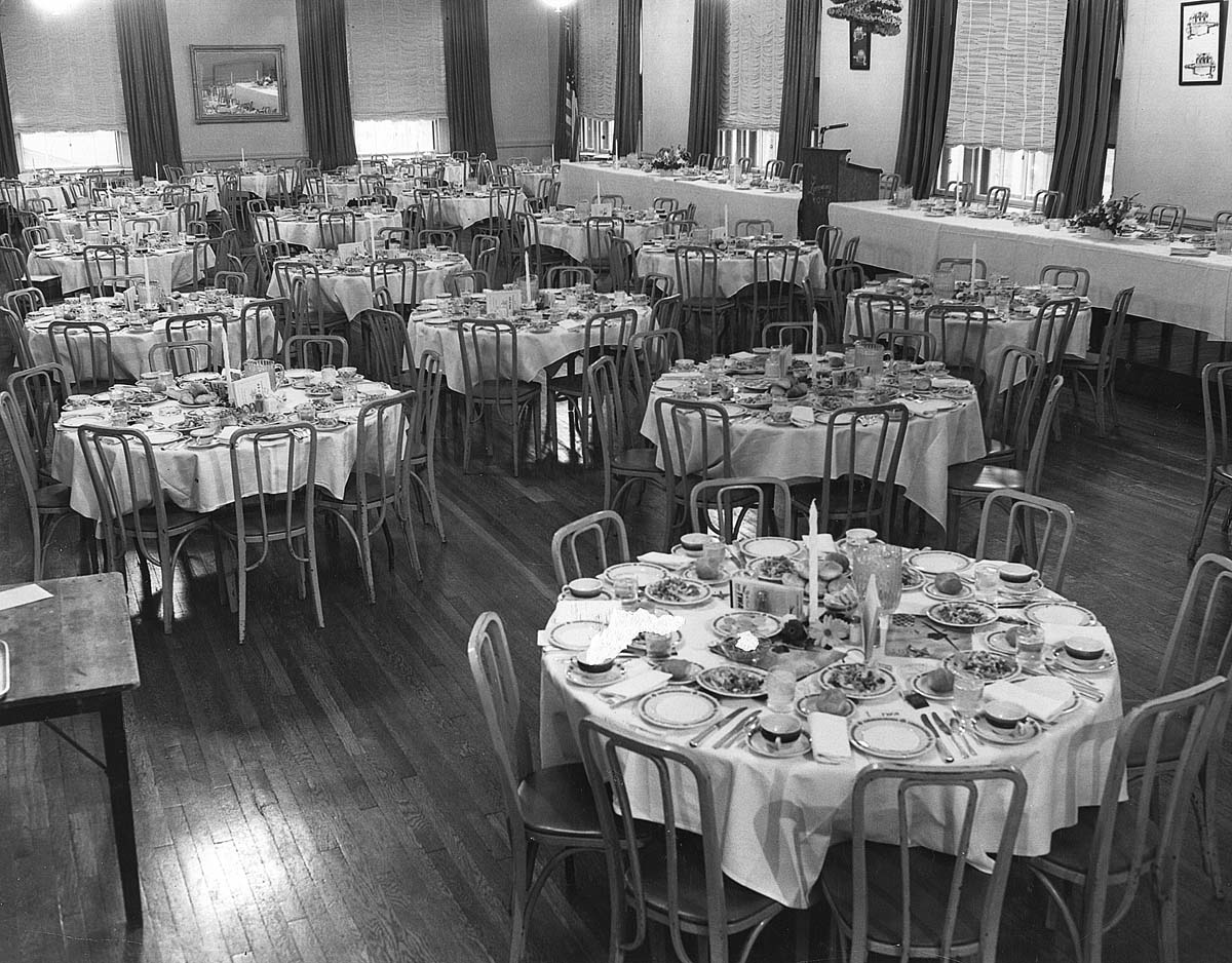 a room with tables and chairs
