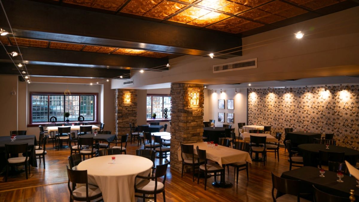 a room with tables and chairs