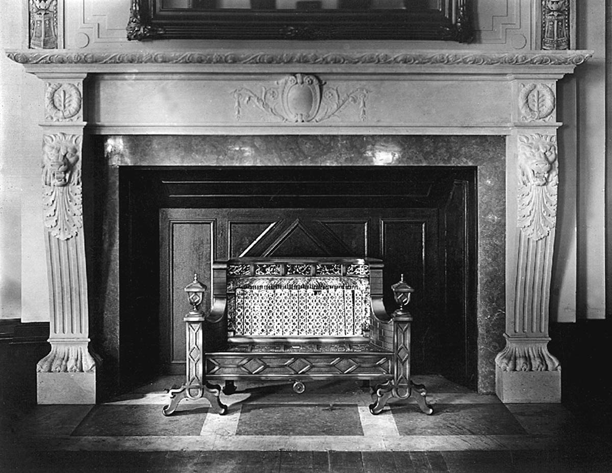 a fireplace with a picture frame
