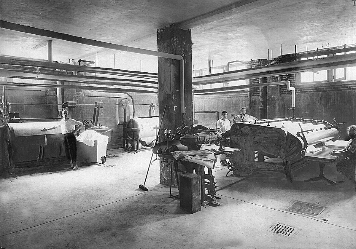a group of men working in a factory