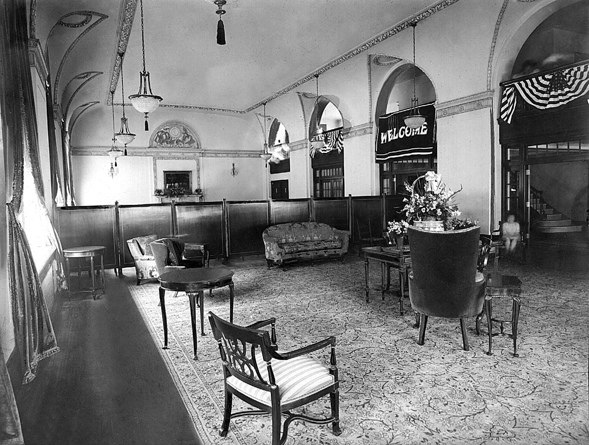 a room with chairs and a table