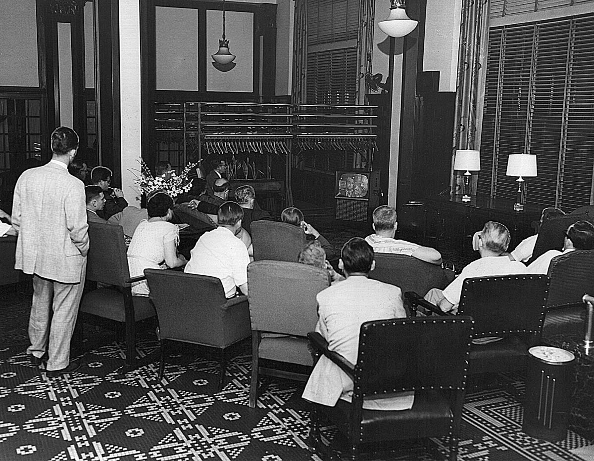 a group of people sitting in chairs
