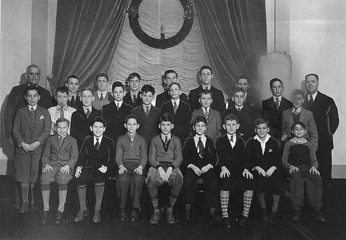a group of boys posing for a photo