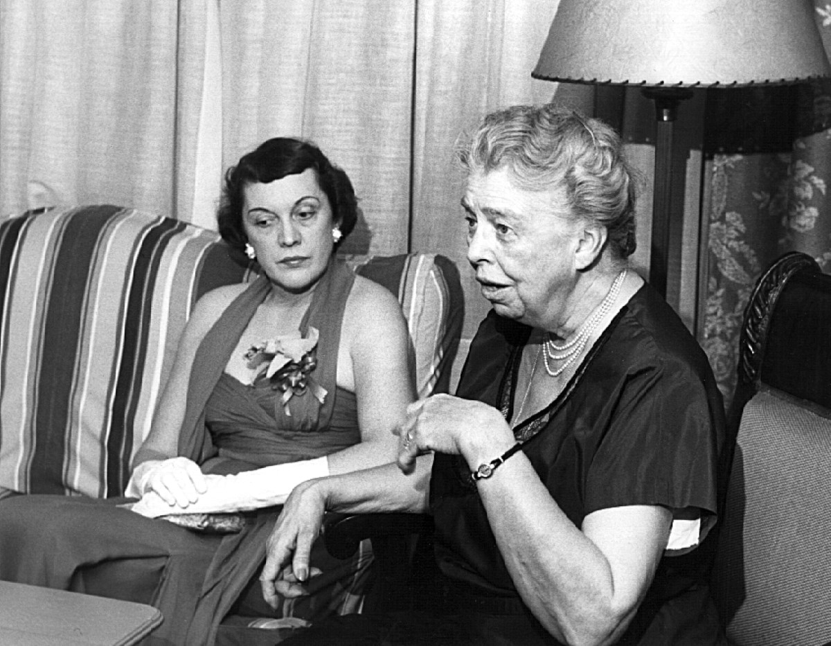 a woman talking to another woman