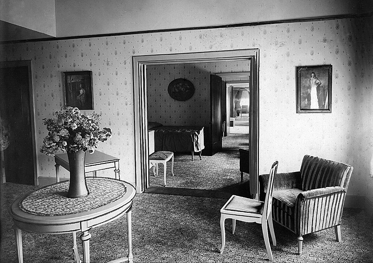 a room with a table and chairs