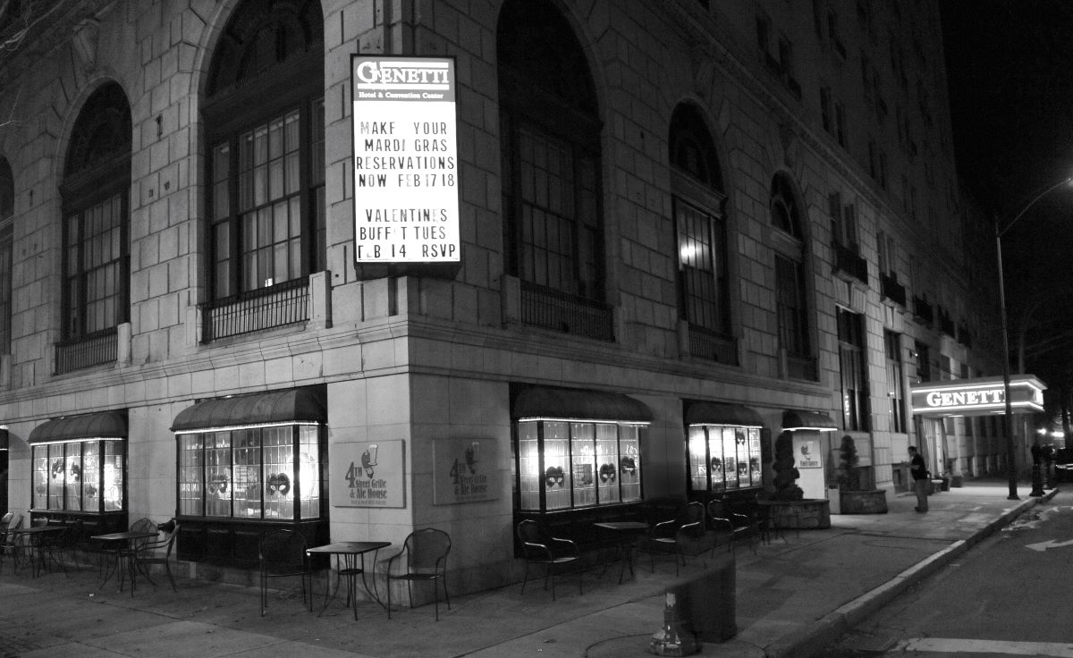 a building with a sign on the corner