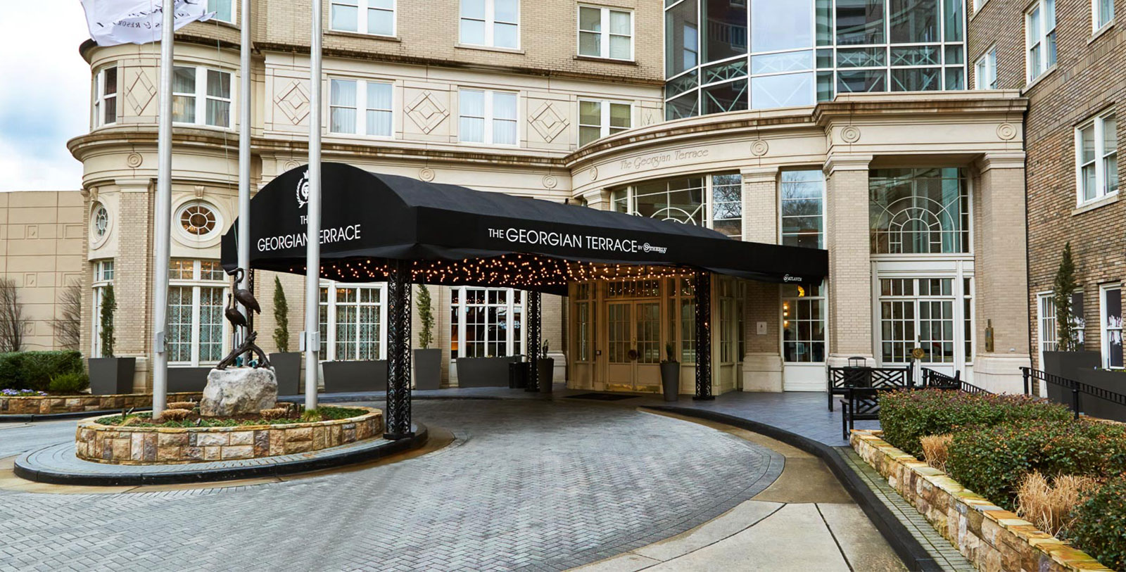 a black awning in front of a building