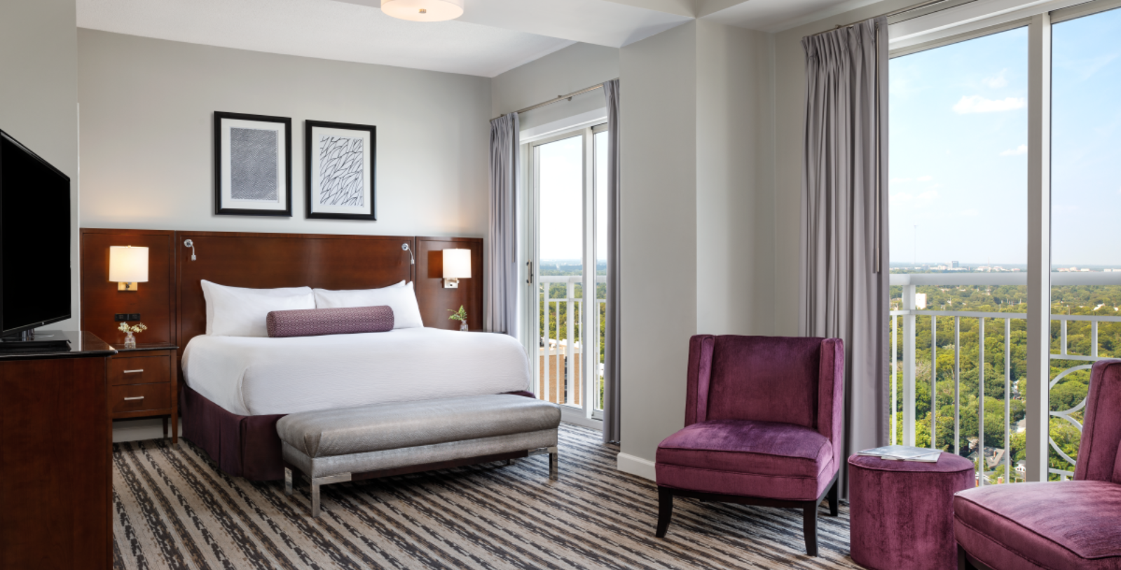 a bedroom with a bed and a chair