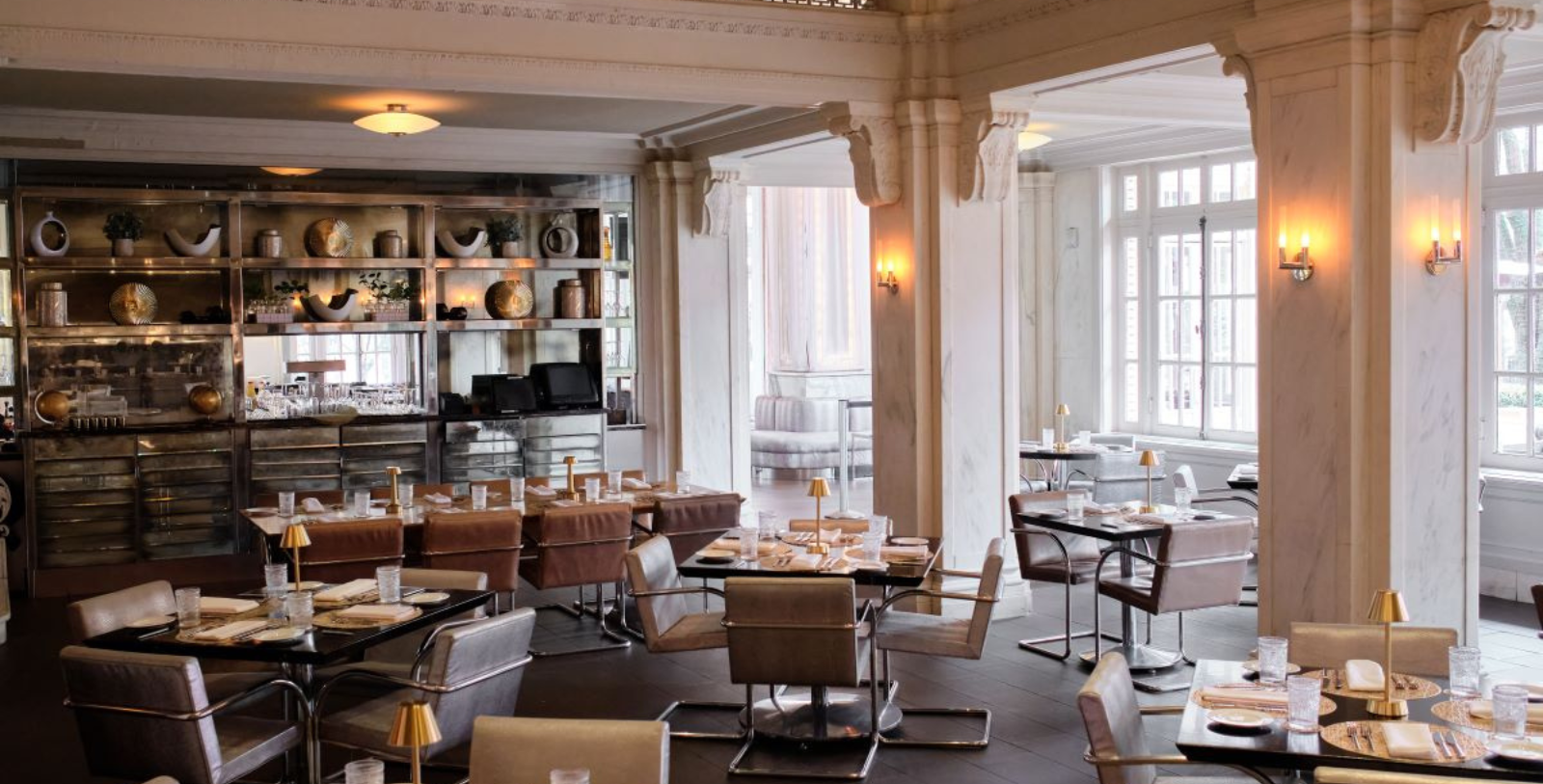 a restaurant with tables and chairs
