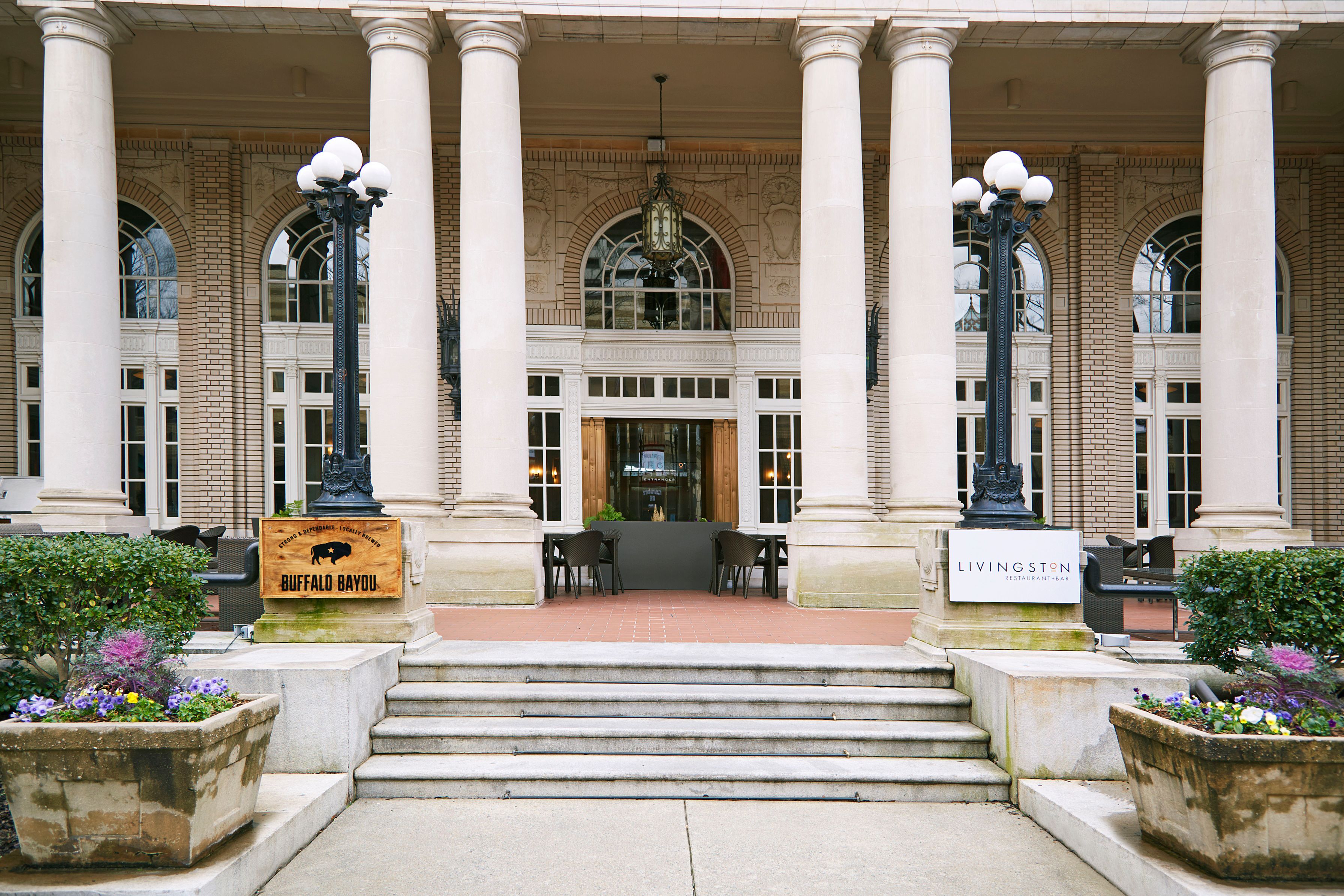 a building with columns and a staircase
