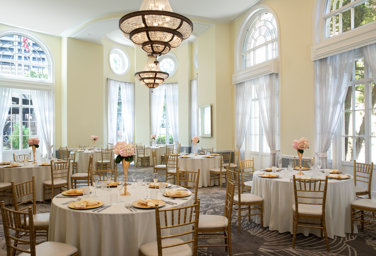 a room with tables and chairs