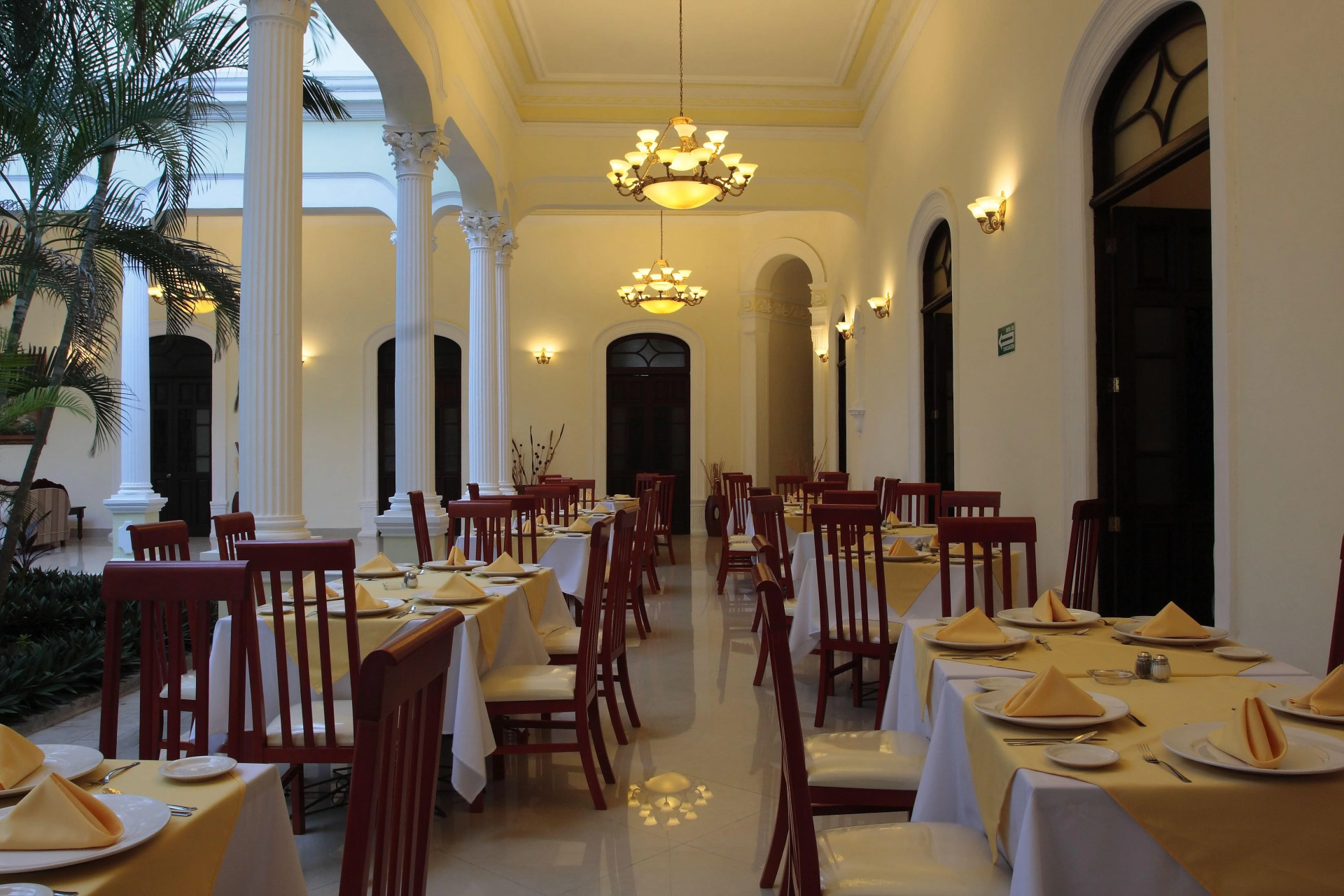 a room with tables and chairs