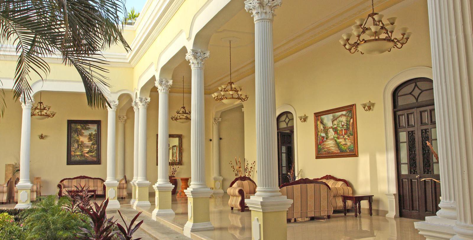 a large white columns in a building