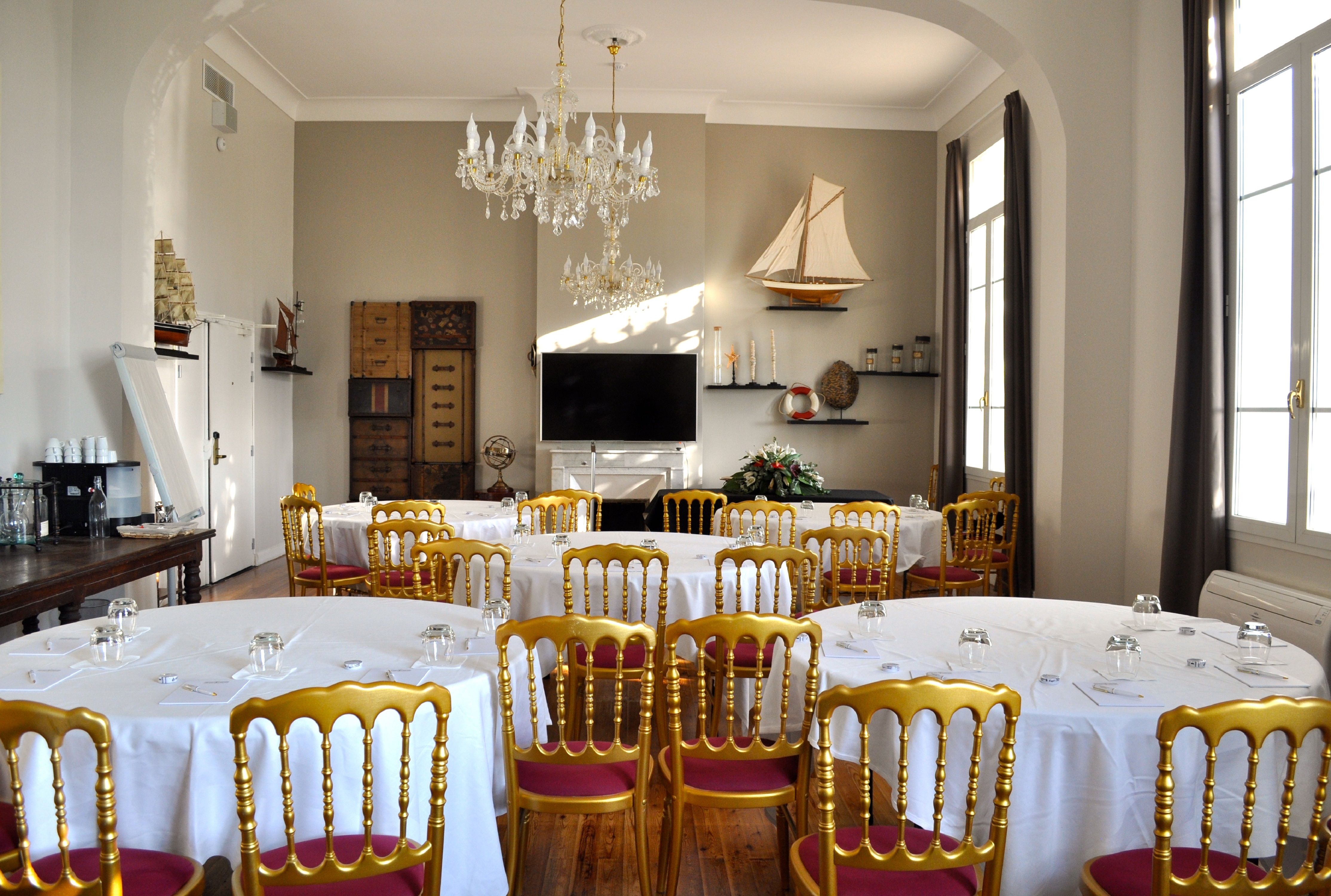 a room with tables and chairs