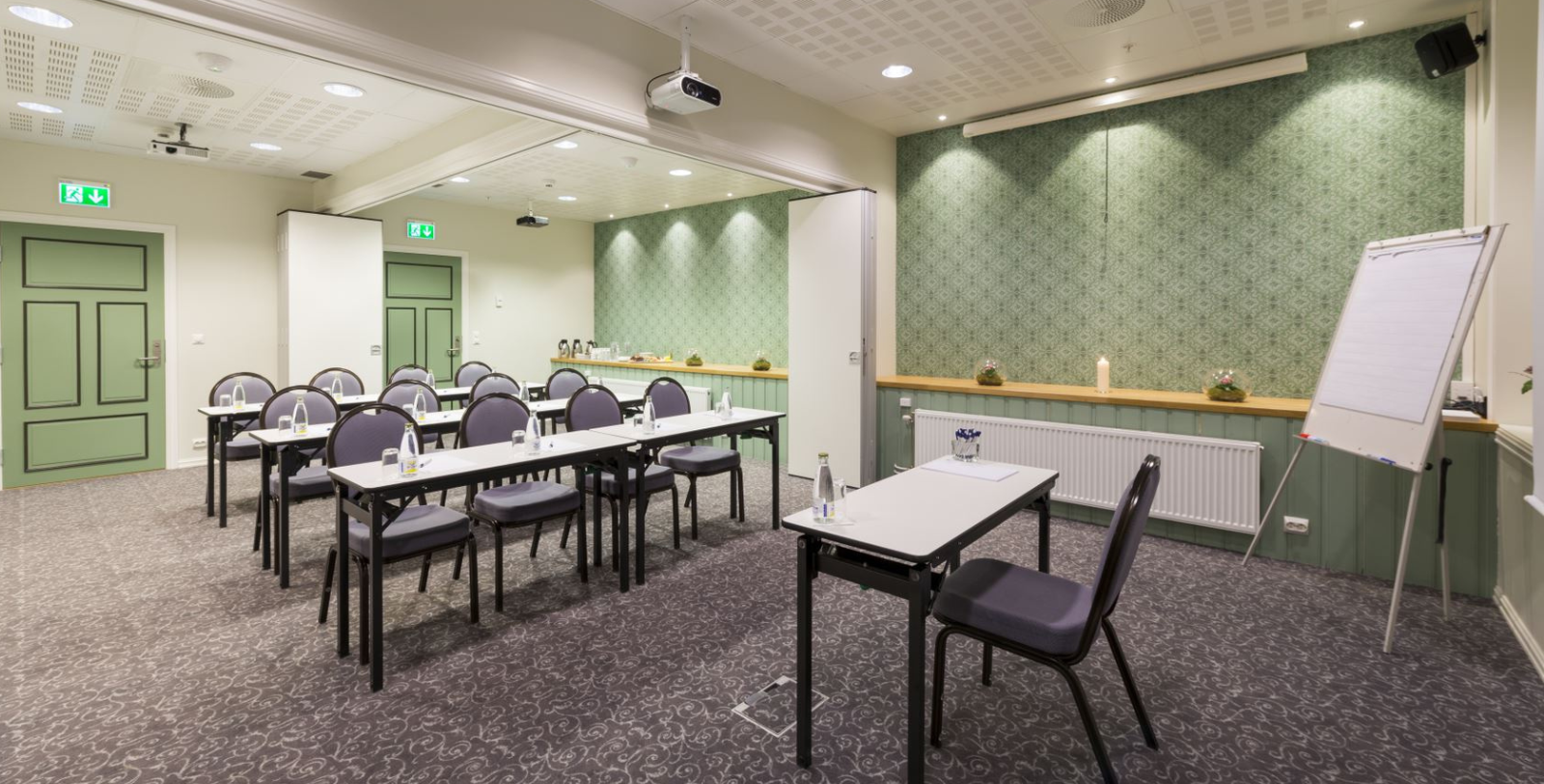 a room with tables and chairs
