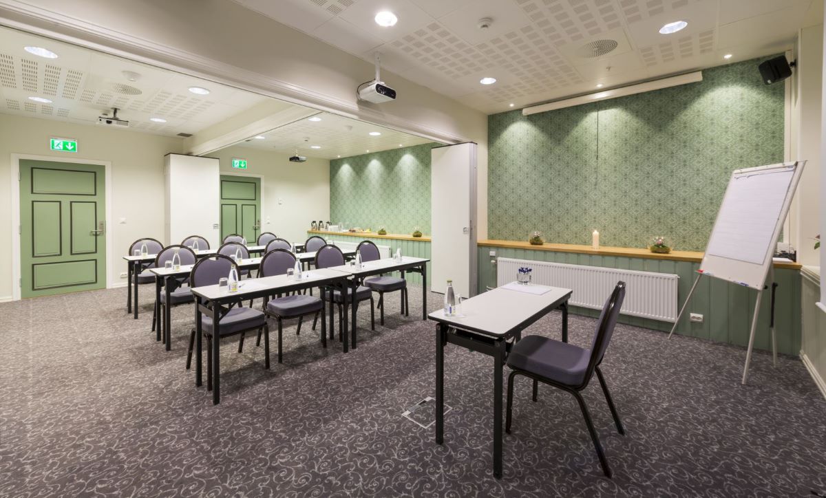 a room with tables and chairs