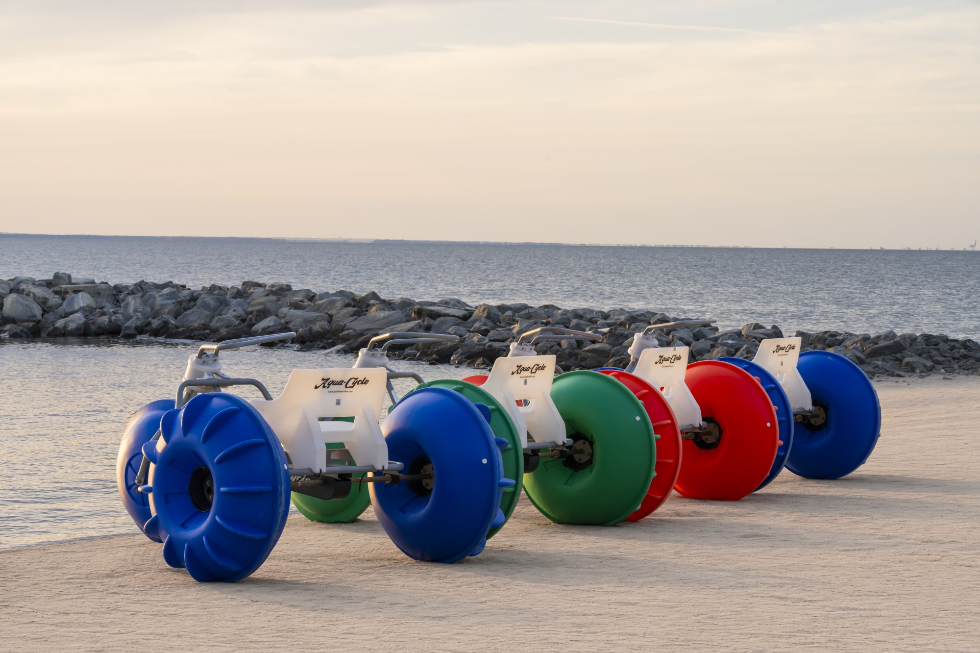 a row of colorful boats on a beach