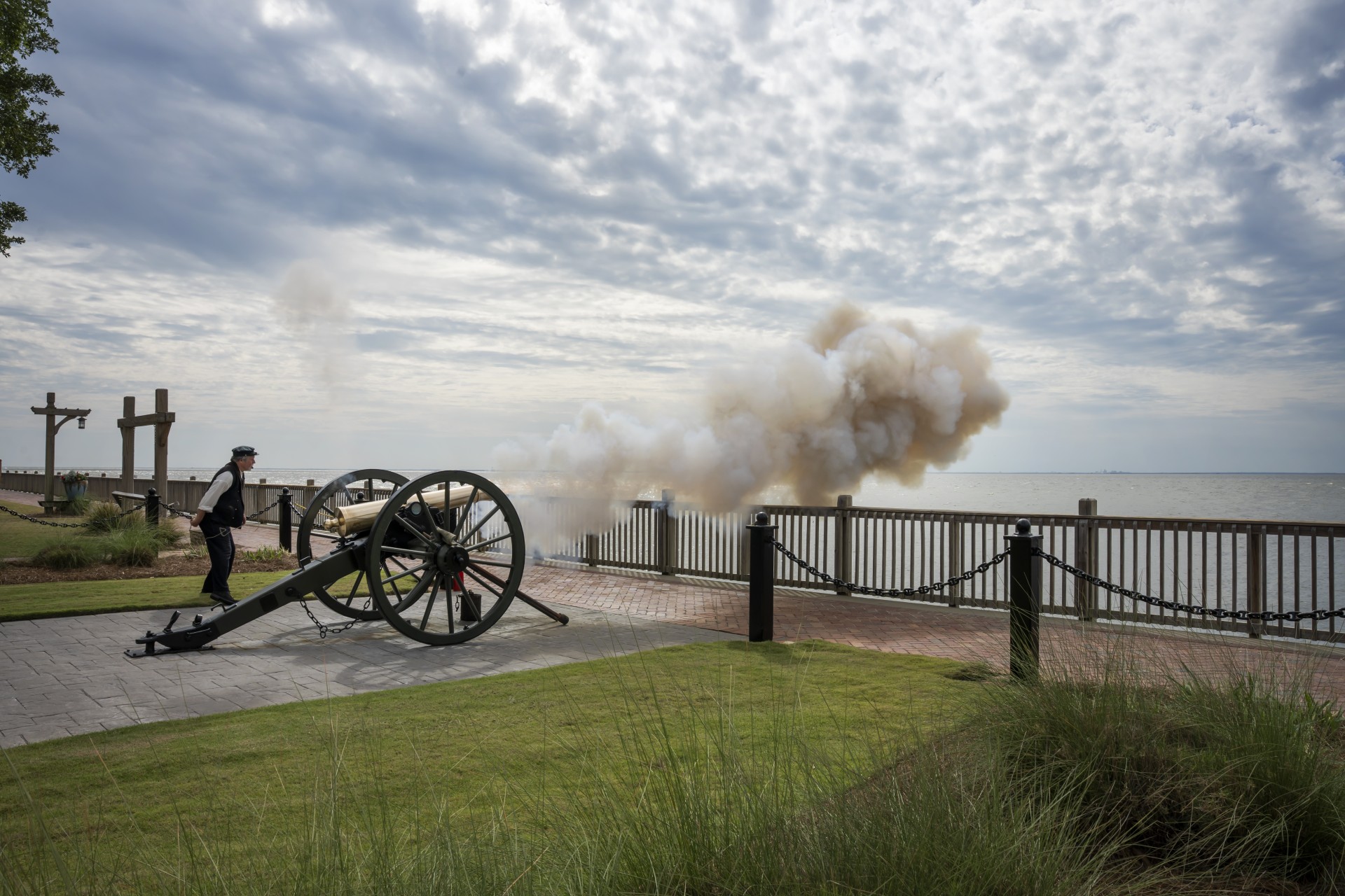 a cannon firing a large explosion
