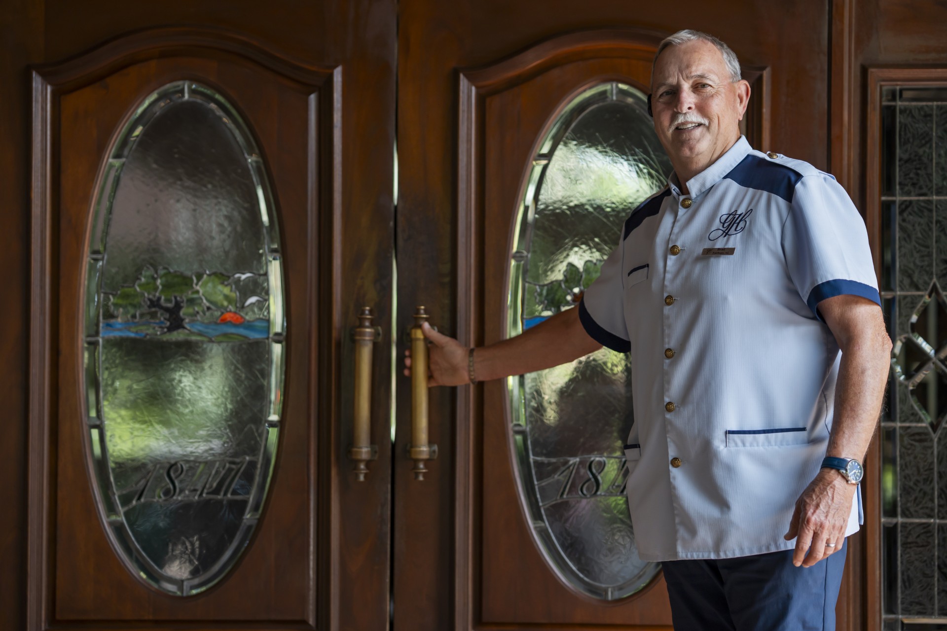 a man standing in front of a door