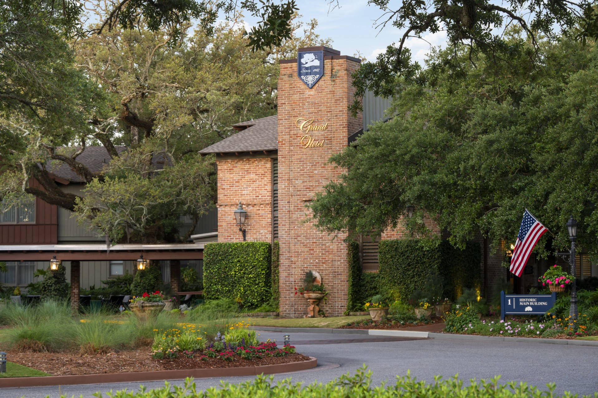 a brick building with a sign on the side