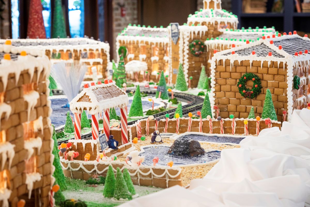 a gingerbread village with trees and buildings