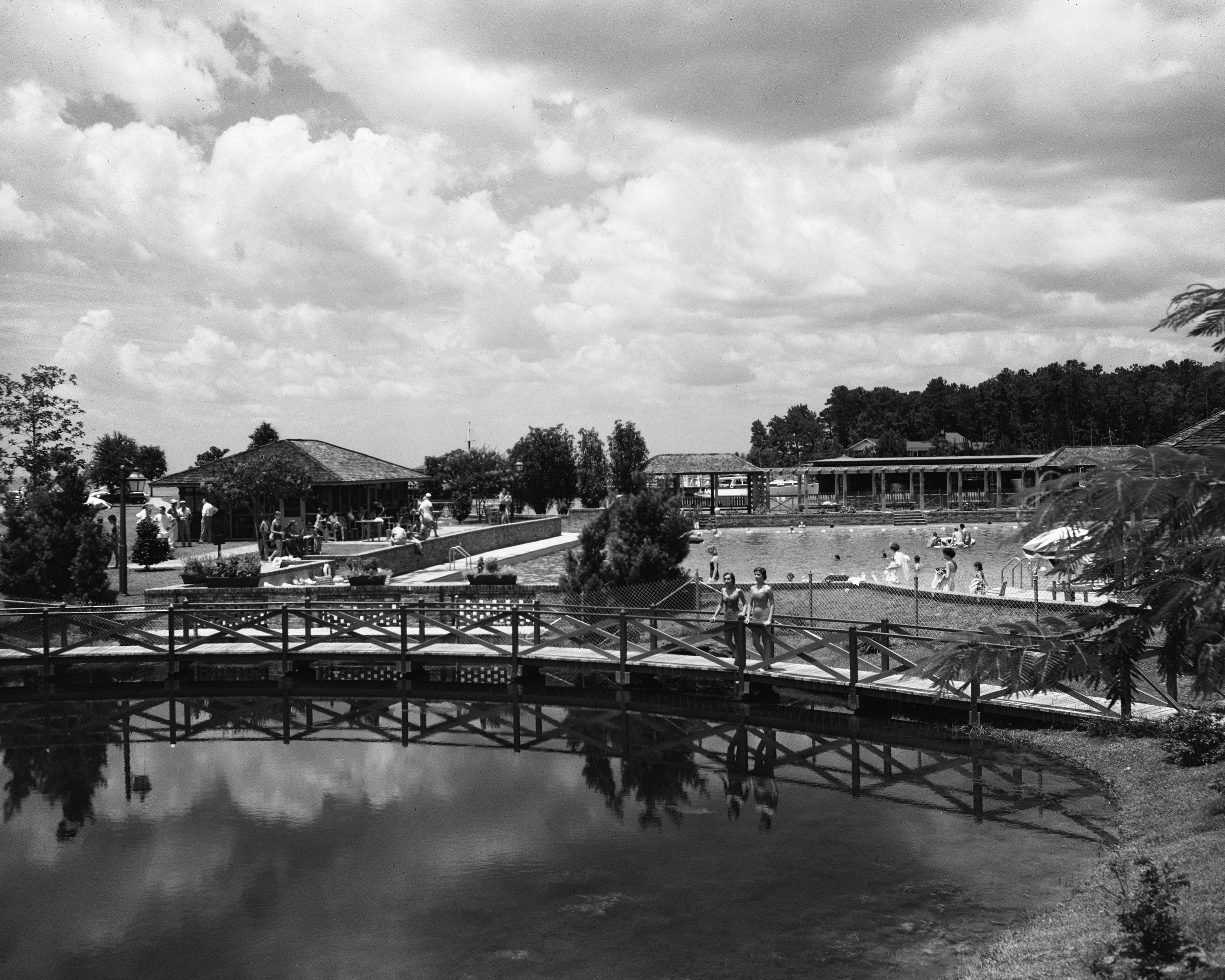 a black and white photo of a pool