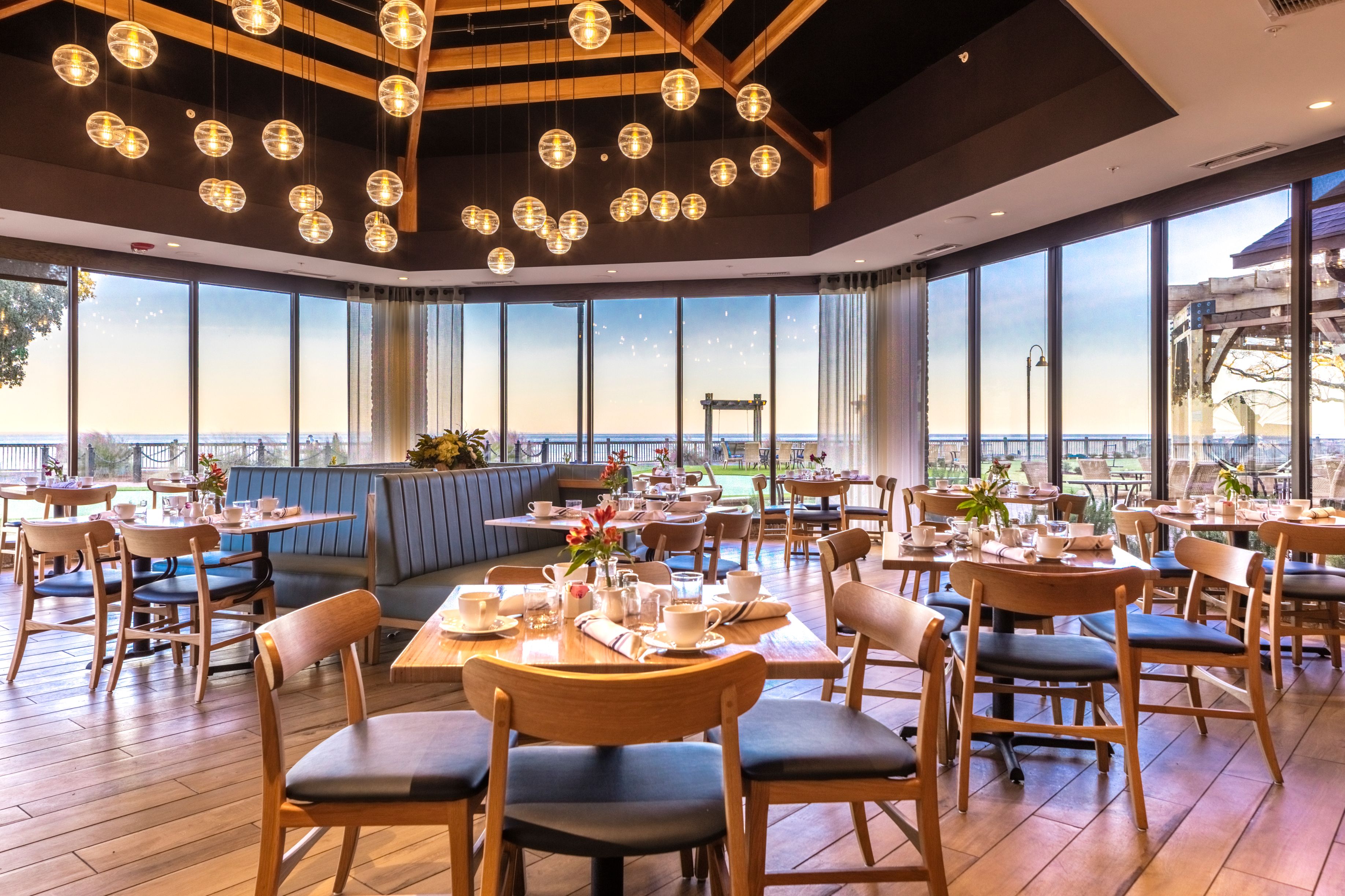 a restaurant with tables and chairs