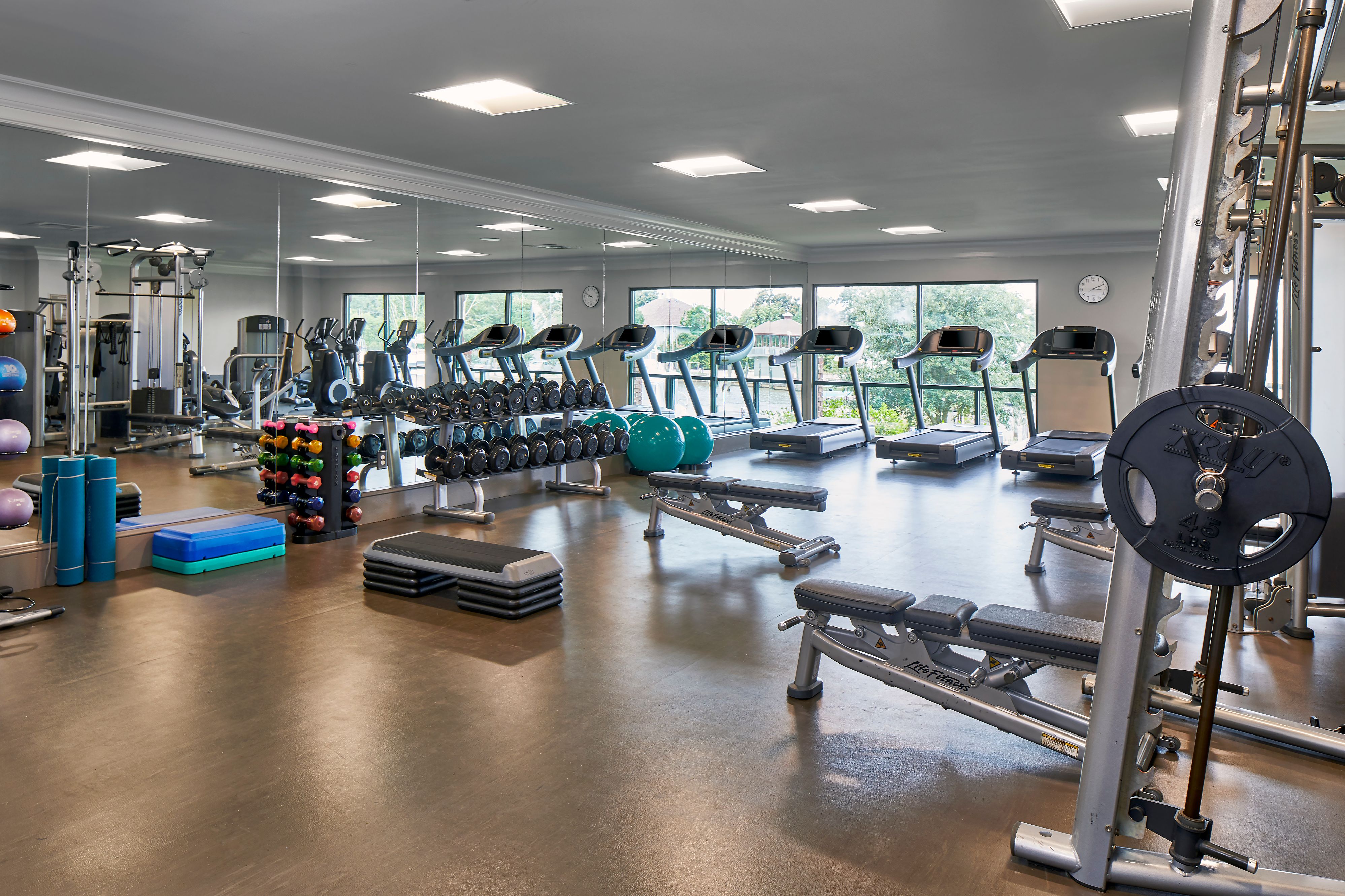 a large gym with exercise equipment