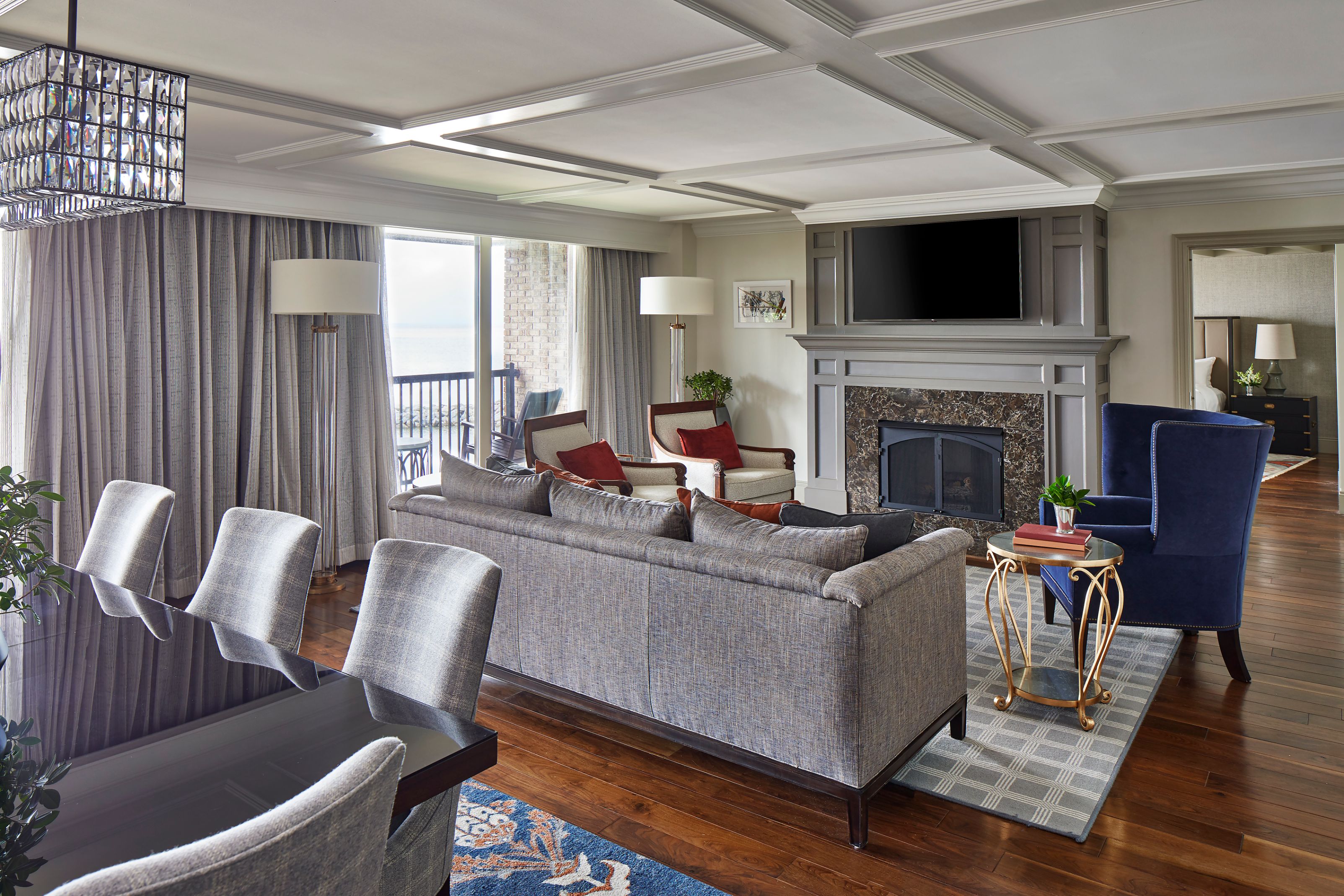 a living room with a fireplace and couches