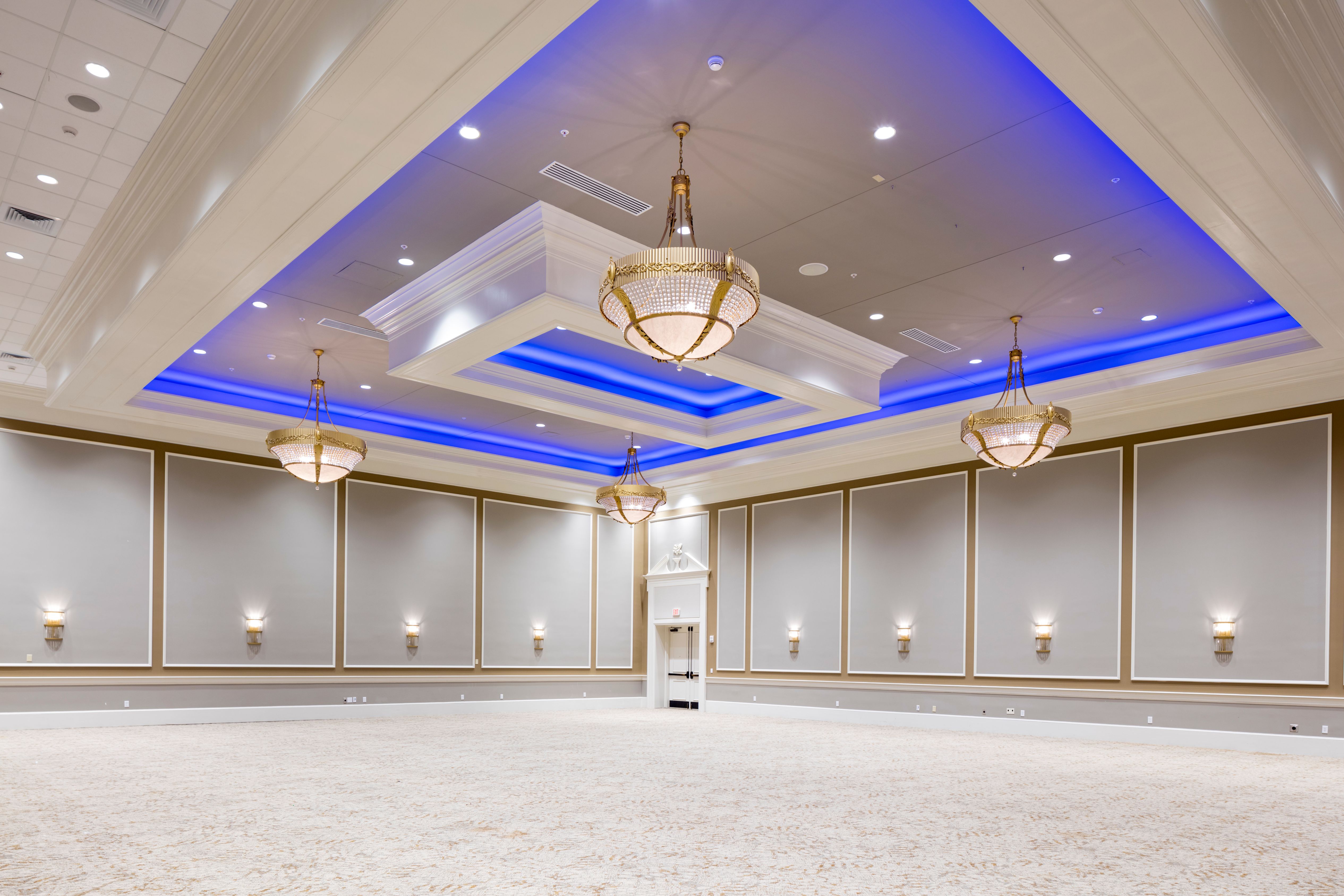 a room with a blue and white ceiling