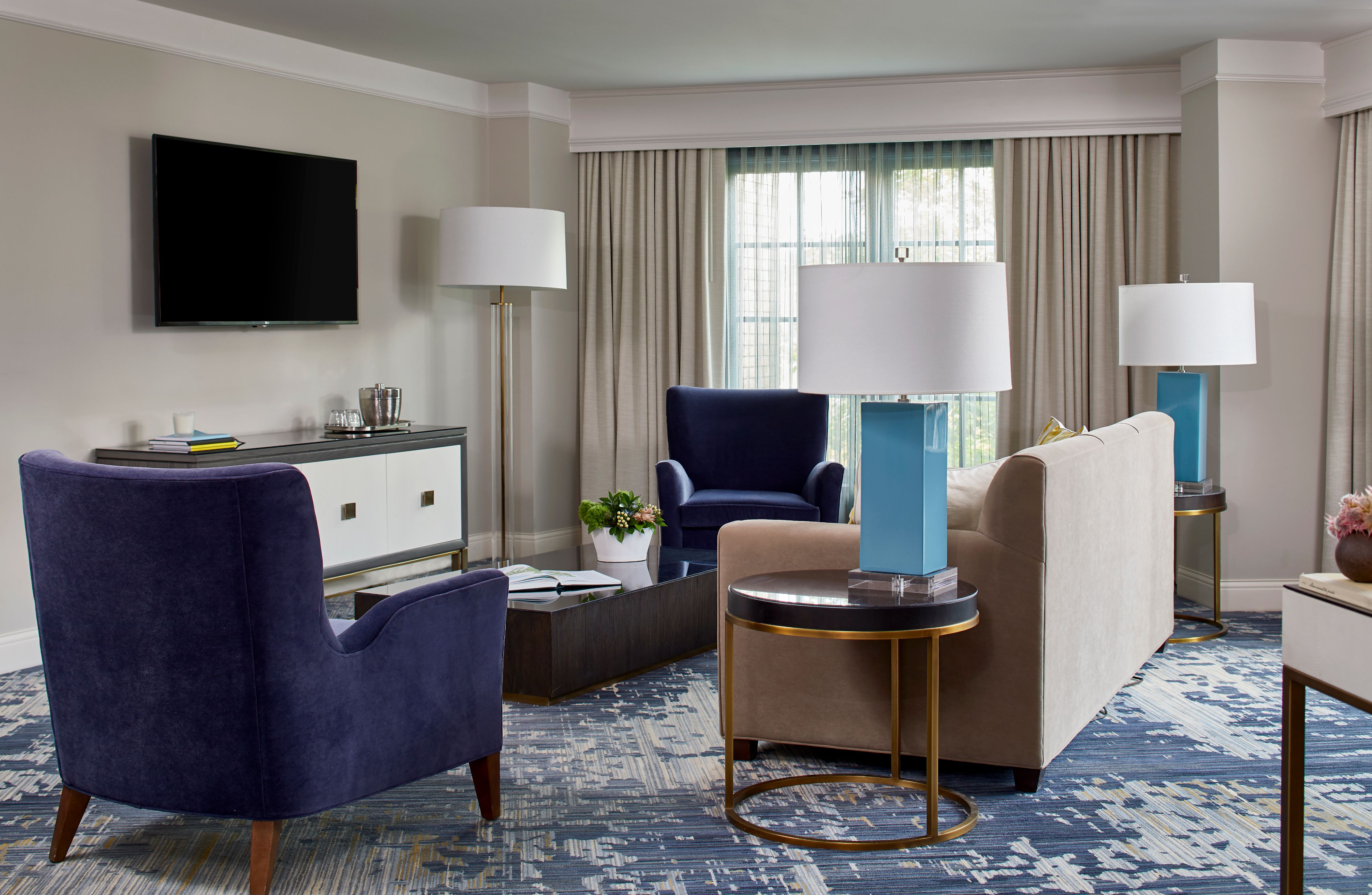 a room with a television and couches