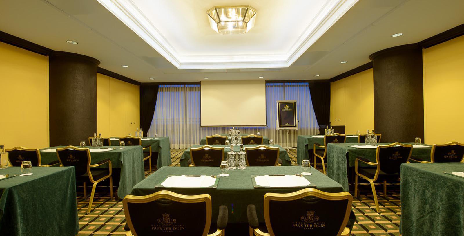 a room with tables and chairs