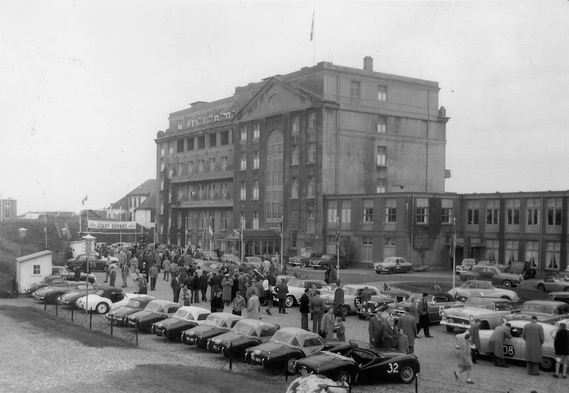 a group of people outside a building
