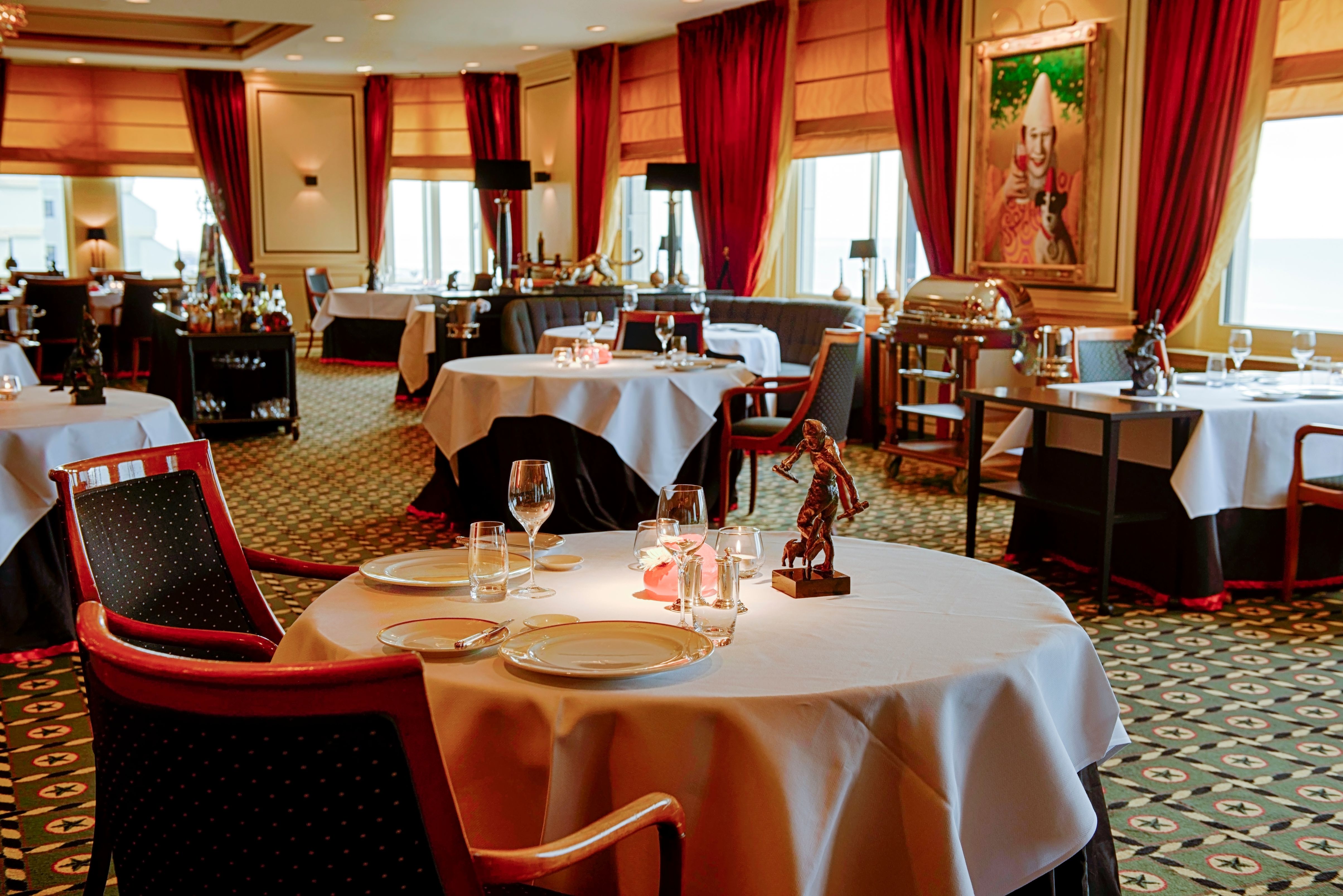 a restaurant with tables and chairs