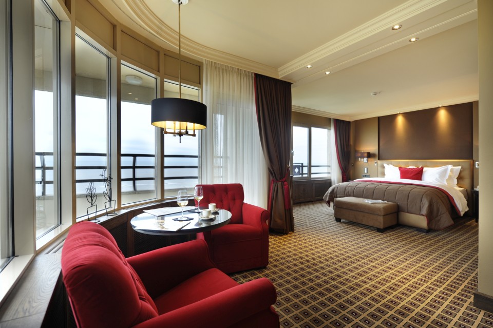 a room with a bed and a bed